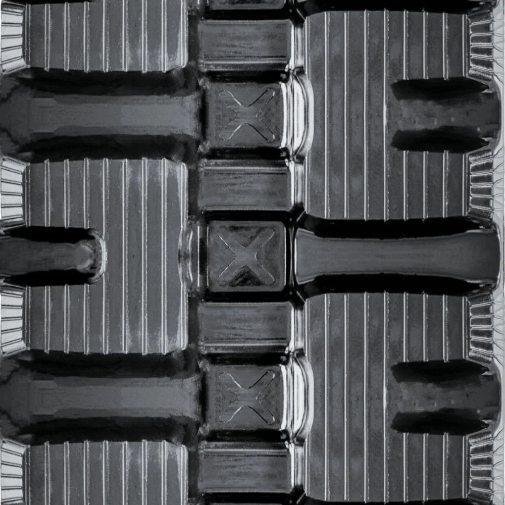 Close up of premium grade rubber track with C-Block tread design.