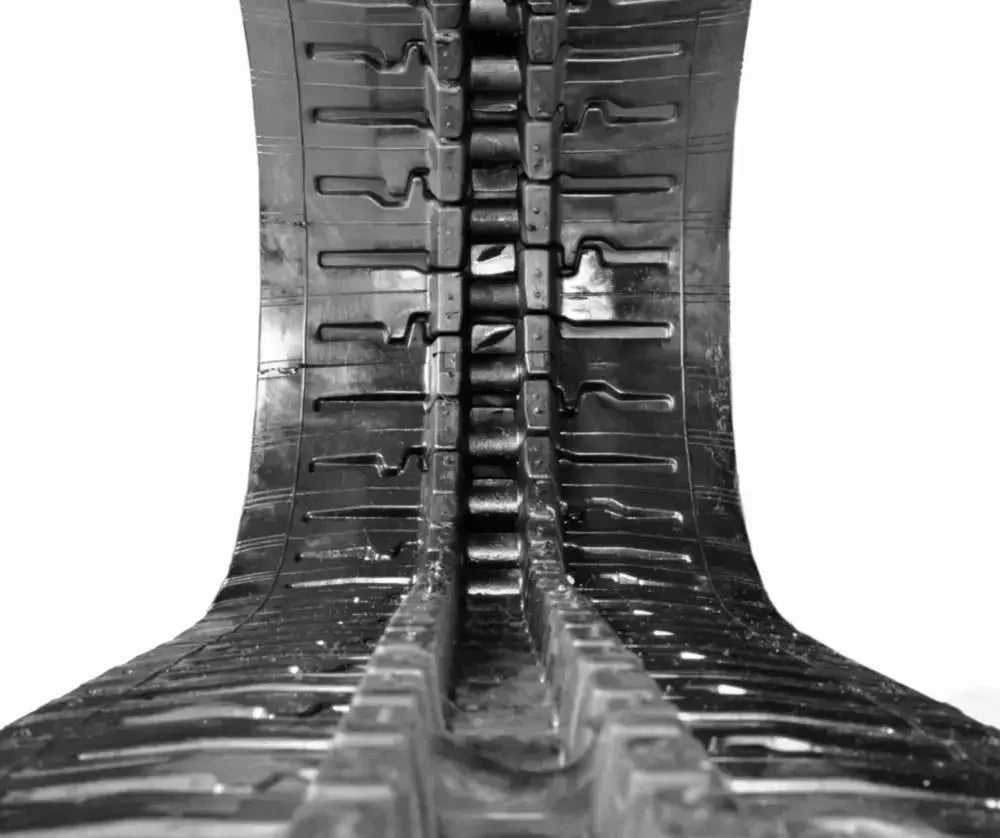 Bobcat E35i Rubber Tracks with interconnected metal links and prominent traction treads