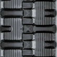 Empty dark gray multi-compartment plastic food tray with textured ridges for Bobcat T140 Rubber Tracks