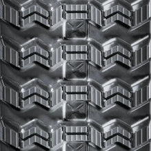 Heavy-duty rubber track with chevron treads and cross-shaped lugs for BOBCAT T595