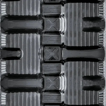 Black plastic packaging tray with compartments and ribbed texture for BOBCAT T650