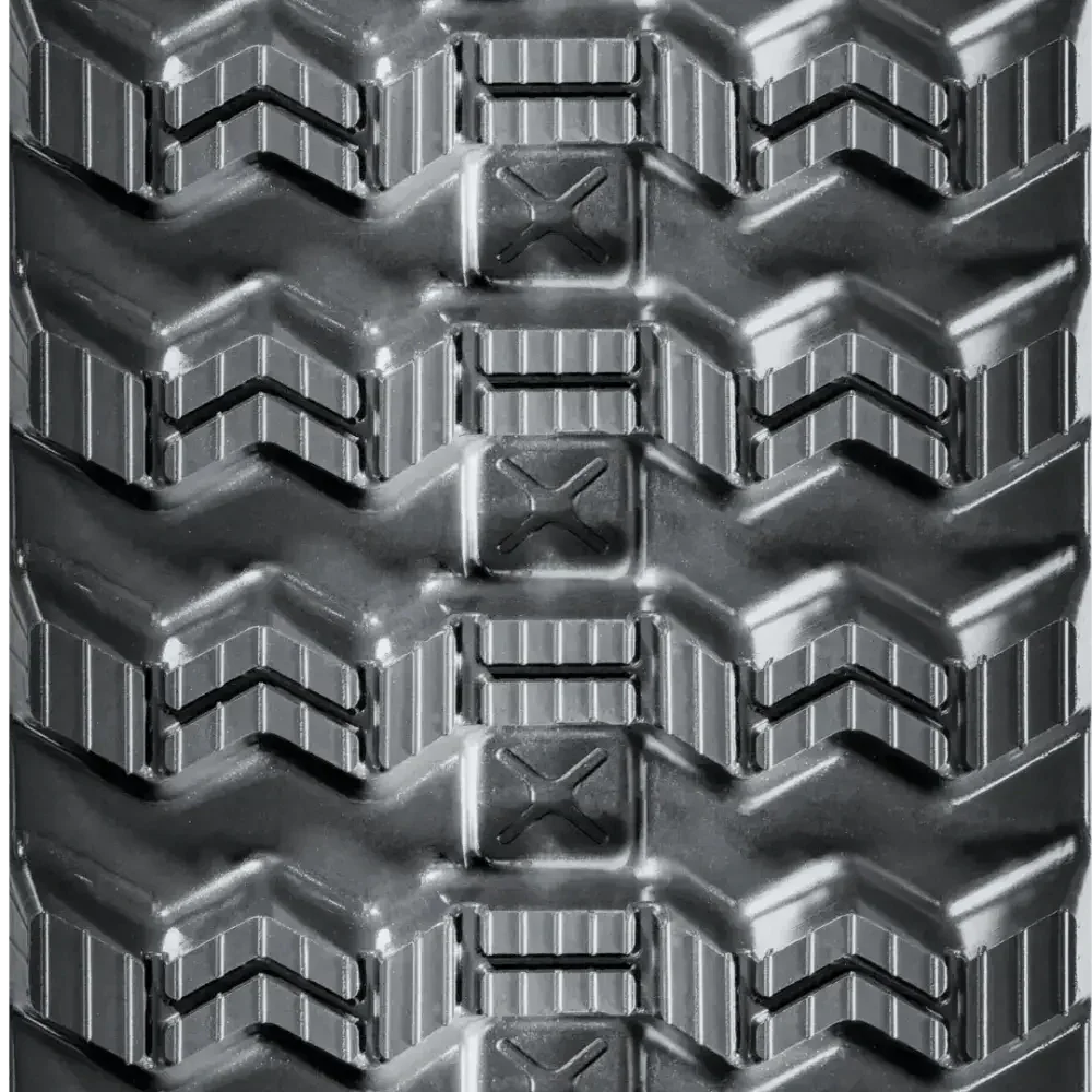 Close-up of BOBCAT T650 tire tread with chevron design and high-traction blocks