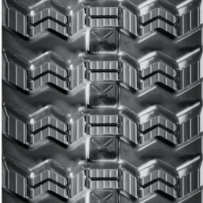 Close-up of BOBCAT T650 tire tread with chevron design and high-traction blocks