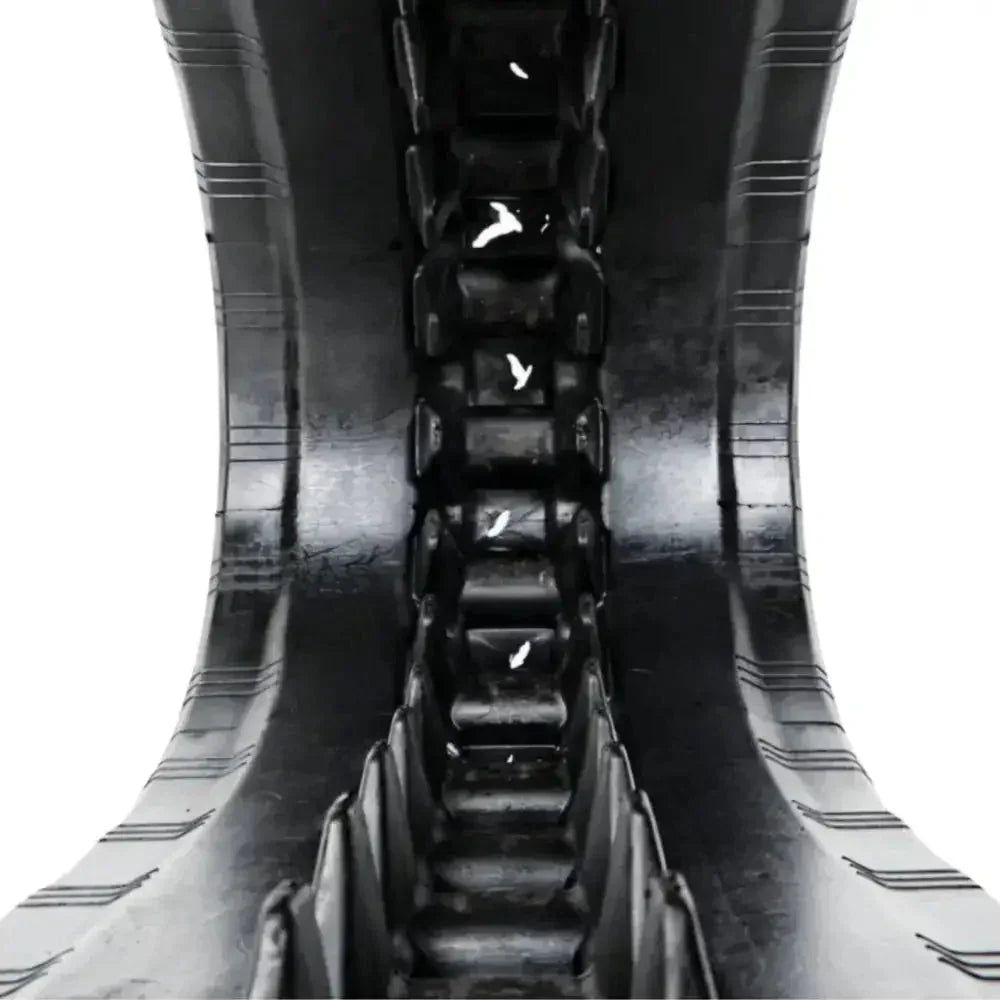 Black rubber track for heavy machinery on GEHL VT320 construction equipment