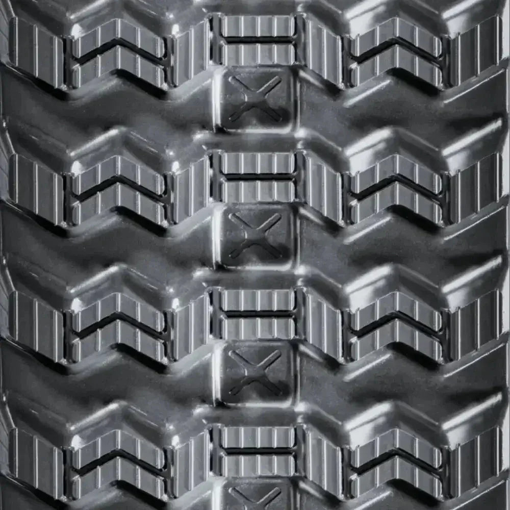 Heavy-duty GEHL VT320 vehicle tire tread with deep chevron patterns and rectangular lugs