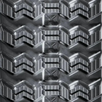 Heavy-duty GEHL VT320 vehicle tire tread with deep chevron patterns and rectangular lugs