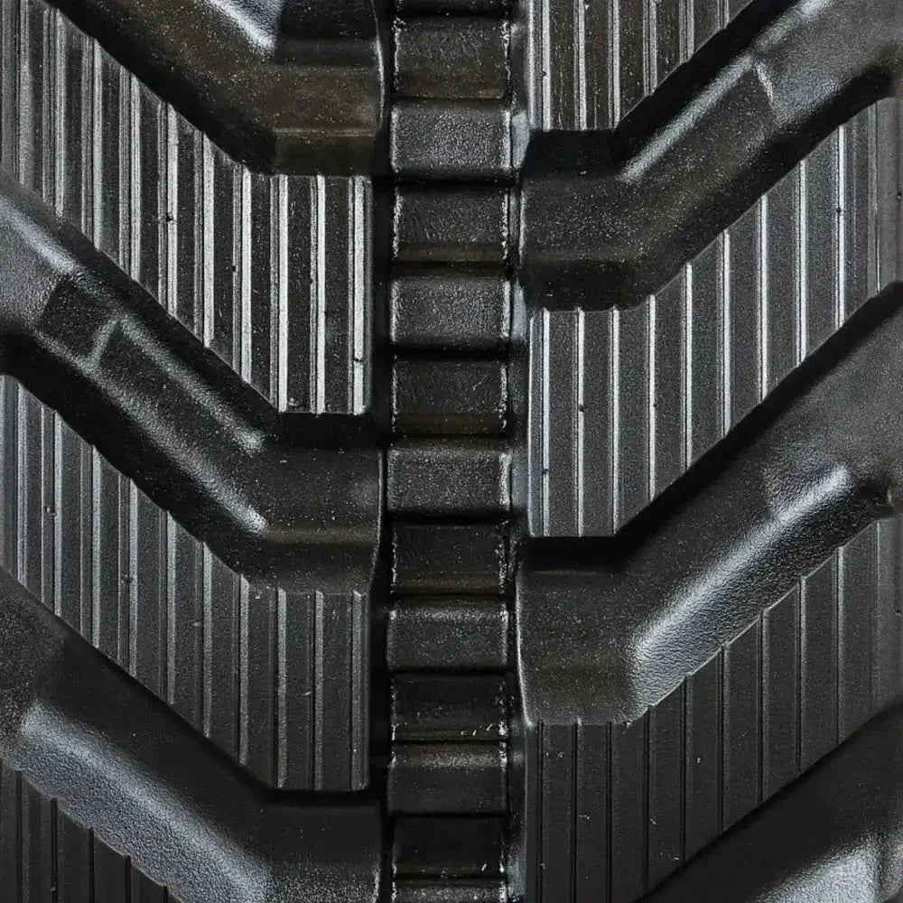Heavy-duty black rubber SANY SY35C track with angular tread pattern and interlocking segments