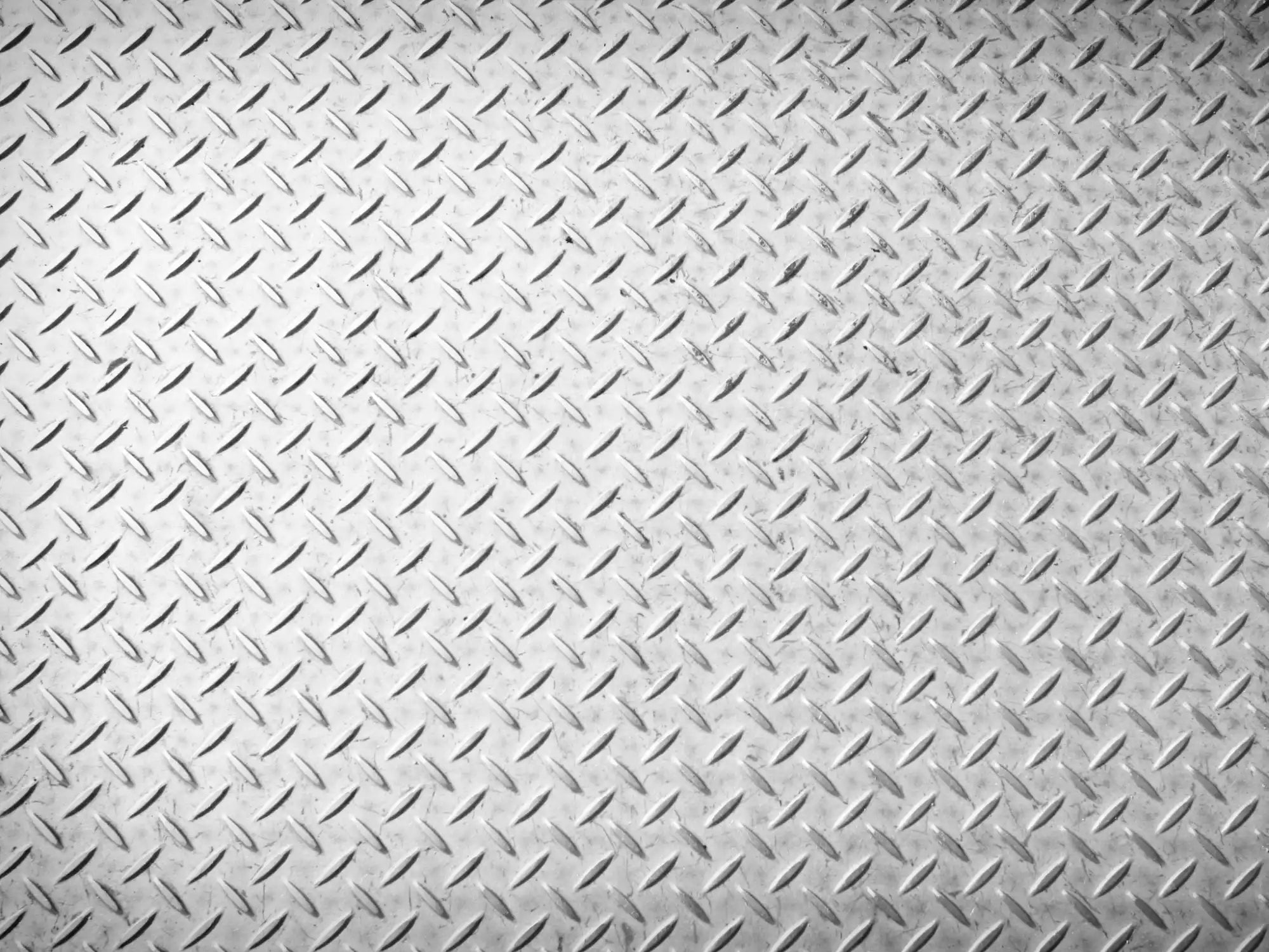 A sheet of diamond plate metal.