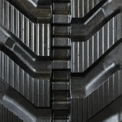 Durable black rubber track with deep tread pattern for heavy-duty traction on TAKEUCHI TB235-2