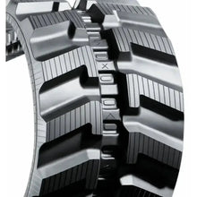 Close-up of TAKEUCHI TB260R heavy-duty rubber track with aggressive tread for traction