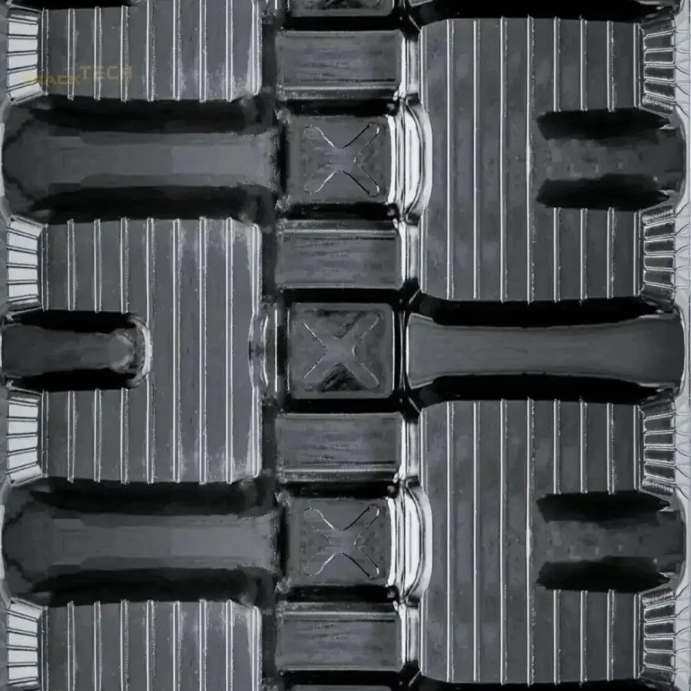Empty black plastic packaging tray with multiple compartments for Takeuchi TL10V2 Rubber Tracks
