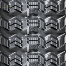 Heavy-duty rubber track with chevron tread pattern and rectangular lugs for Takeuchi TL10V2