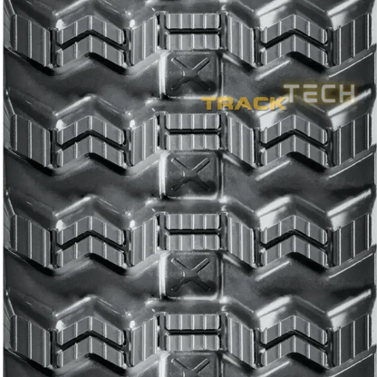 Heavy-duty Takeuchi TL12R2 replacement rubber track with aggressive chevron tread pattern