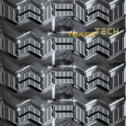 Heavy-duty rubber track with chevron tread pattern for Takeuchi TL12V2 excavator