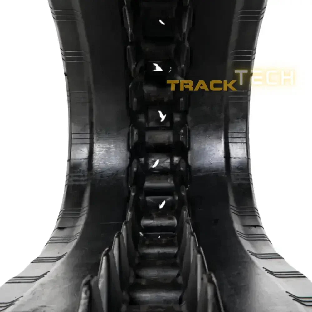Rubber track for Takeuchi TL8 heavy machinery replacement on rugged terrain