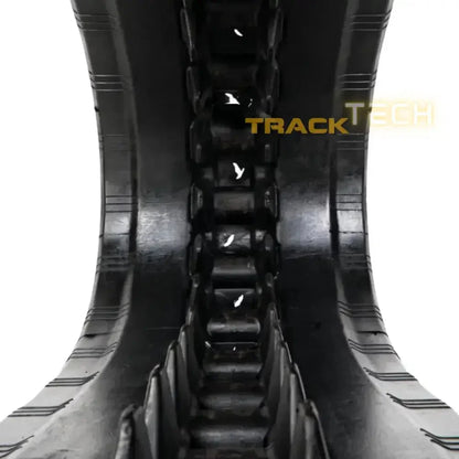 Rubber track for Takeuchi TL8 heavy machinery replacement on rugged terrain