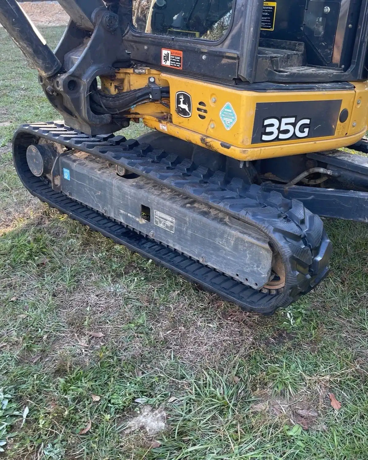 John Deere 35G Mini excavator with newly installed rubber tracks